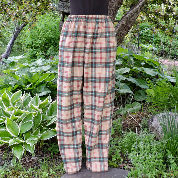 Tartan pants displayed outdoors among greenery
